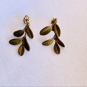 Michael Michaud pierced earrings.